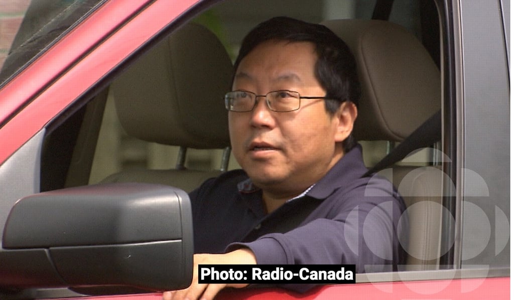 Former unlicensed immigration consultant Xun “Sunny” Wang, in a photo taken by Radio-Canada's investigative programme Enquête as he was leaving his home in Richmond, British Columbia. Wang, who was freed from prison in late 2017, refused to answer Radio-Canada's questions; nor did he respond to a written request for a response left by the South China Morning Post at his home. Photo: Harold Dupuis / Radio-Canada