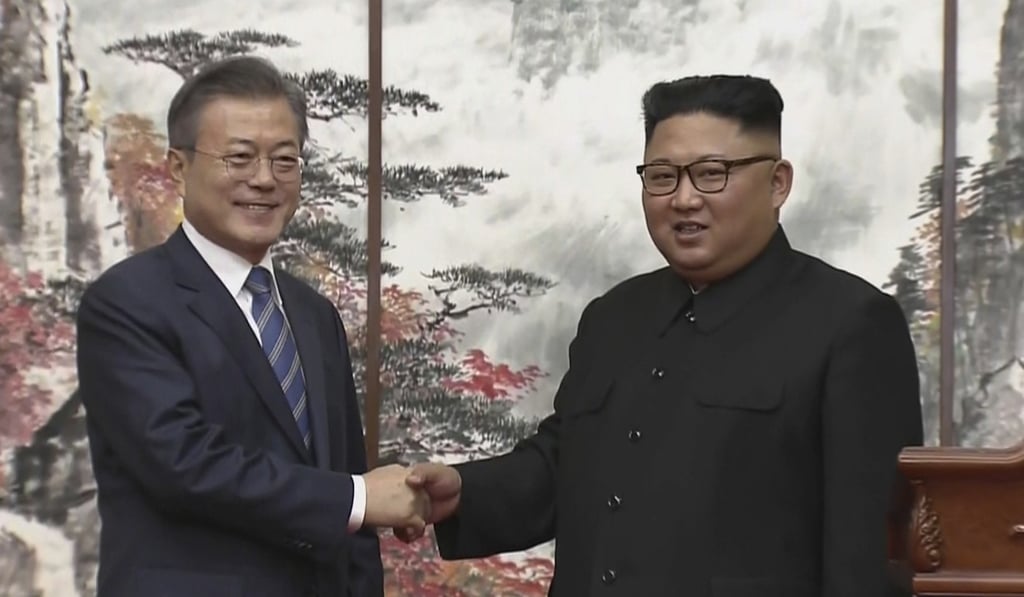North Korean leader Kim Jong-Un (right) and South Korean President Moon Jae-in shake hands at the end of their joint press conference in Pyongyang. Photo: AP North Korean leader Kim Jong-Un (right) and South Korean President Moon Jae-in shake hands at the end of their joint press conference in Pyongyang. Photo: AP
