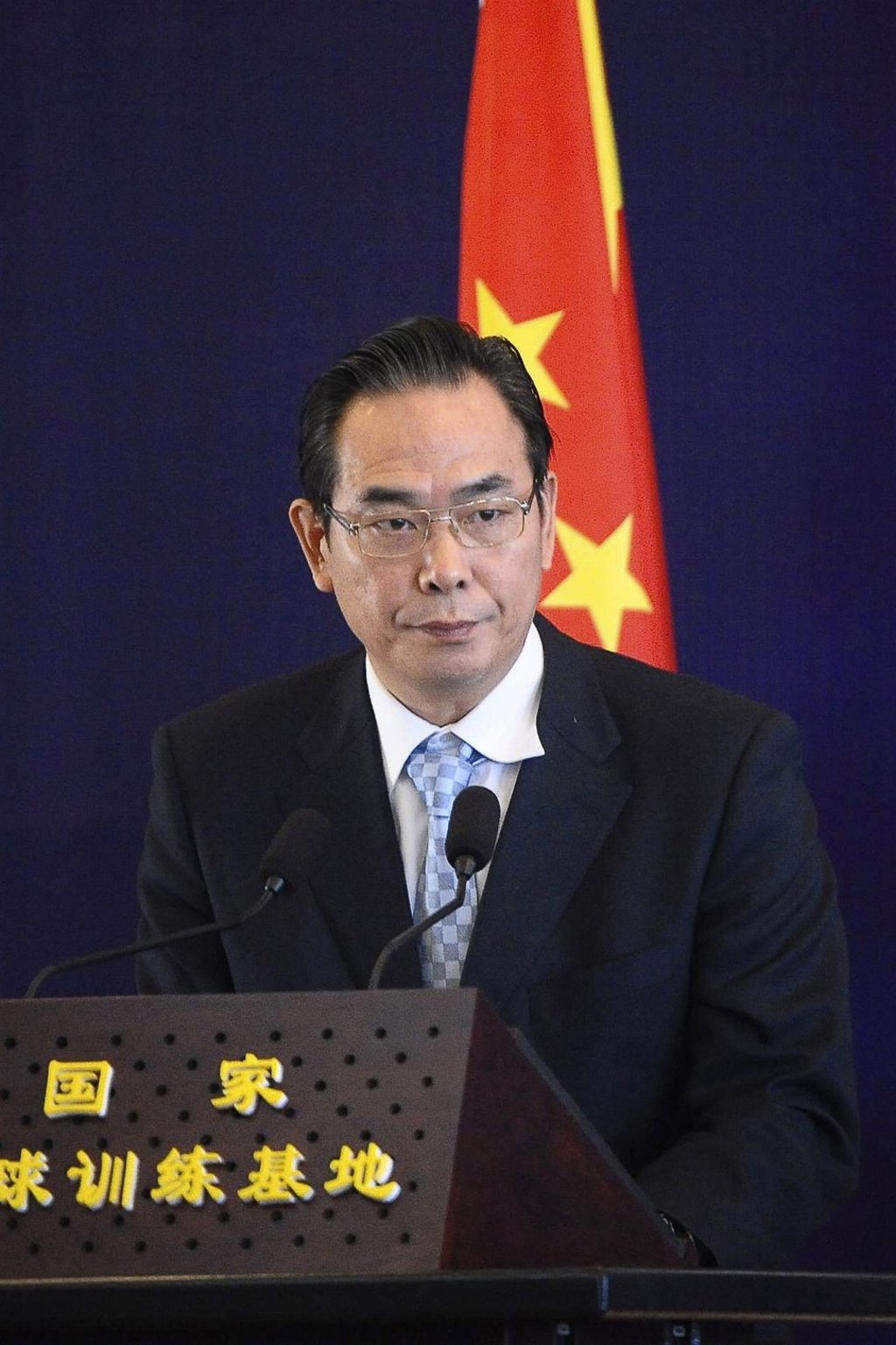 Cai Zhenhua speaks during a meeting at the National Football Training Base in Xianghe, Hebei province in January 21, 2014. Photo: Reuters