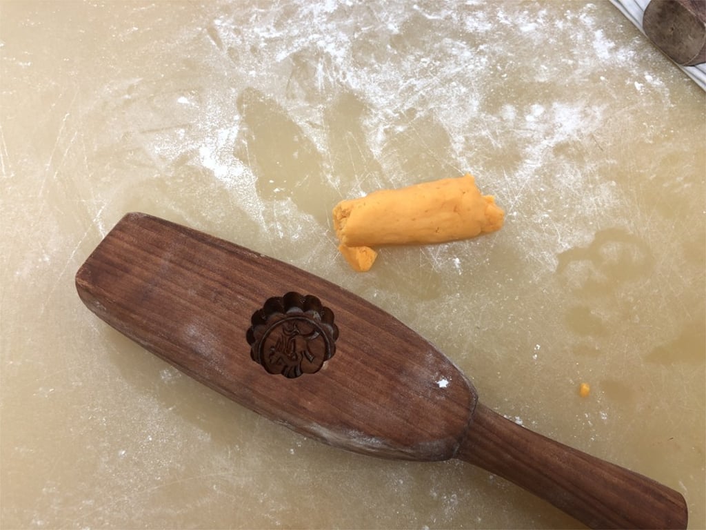 The dough for the mooncakes’ outer crust and the mould for Spring Moon mooncakes – outer wrapping ingredients include butter, milk powder, flour, sugar and eggs.