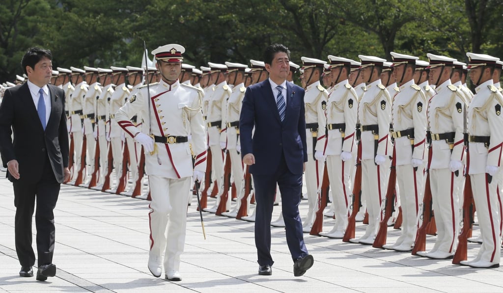 Japanese Prime Minister Shinzo Abe, third from left, dreams of reforming Japan’s post second World War Pacifist Constitution. Photo: AP