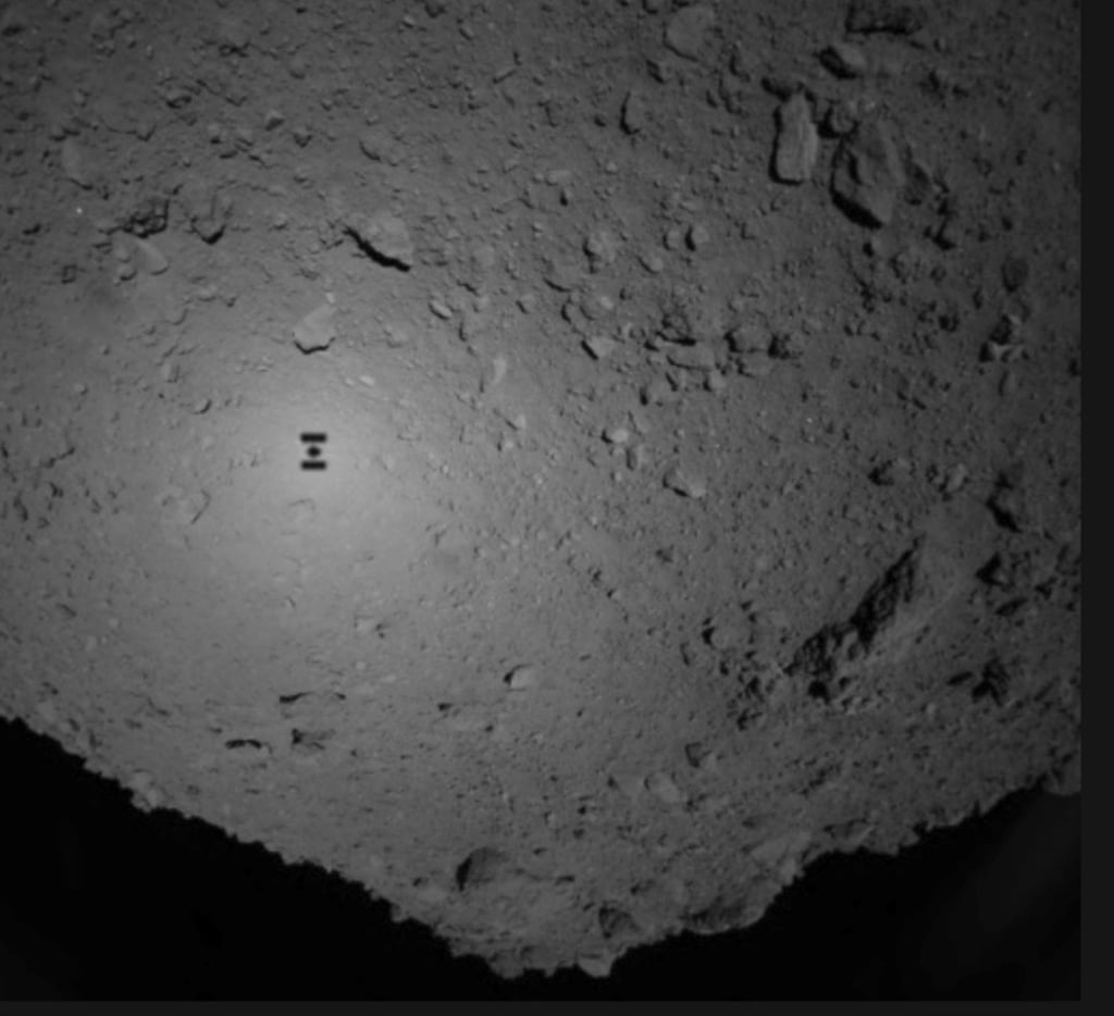 A JAXA image showing the shadow of Hayabusa2 over the asteroid Ryugu on Friday, September 21, 2018. Photo: AP A JAXA image showing the shadow of Hayabusa2 over the asteroid Ryugu on Friday, September 21, 2018. Photo: AP