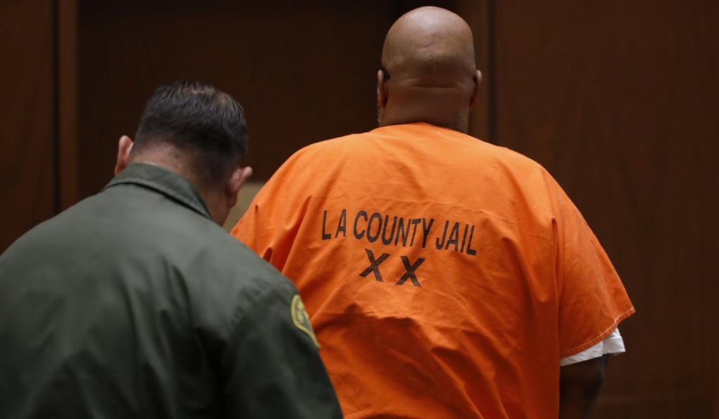 Former rap mogul Marion “Suge” Knight is escorted out of the Los Angeles Superior Court Thursday. Photo: AP Former rap mogul Marion “Suge” Knight is escorted out of the Los Angeles Superior Court Thursday. Photo: AP