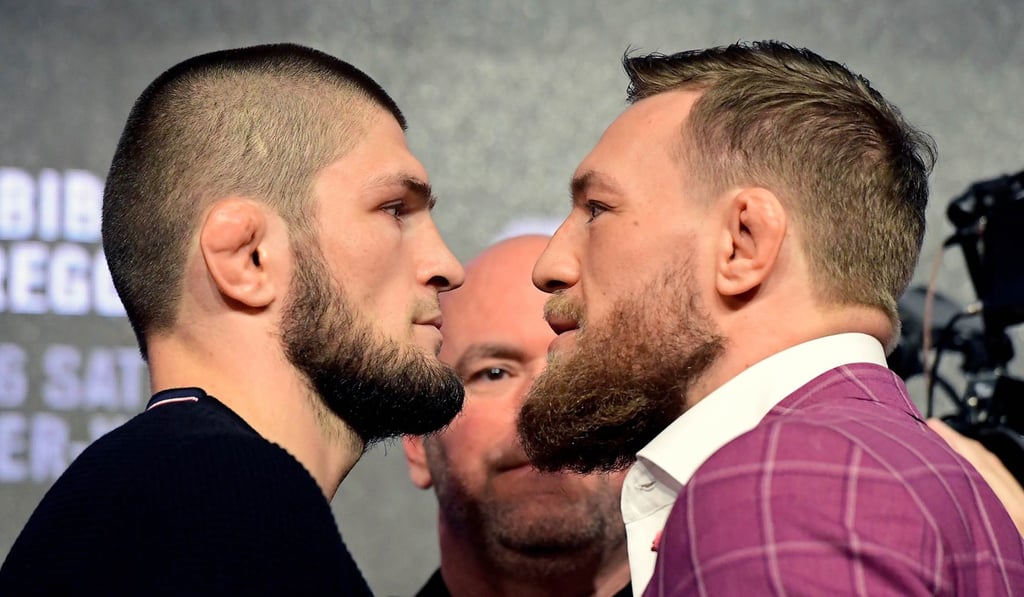 Lightweight champion Khabib Nurmagomedov faces off with McGregor. Photo: AFP Lightweight champion Khabib Nurmagomedov faces off with McGregor. Photo: AFP