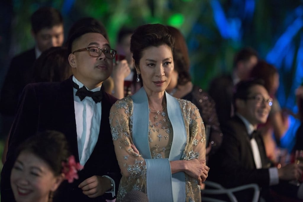 Michelle Yeoh (with Nico Santos, above) plays Eleanor Young, Nick’s mother, in ‘Crazy Rich Asians’.