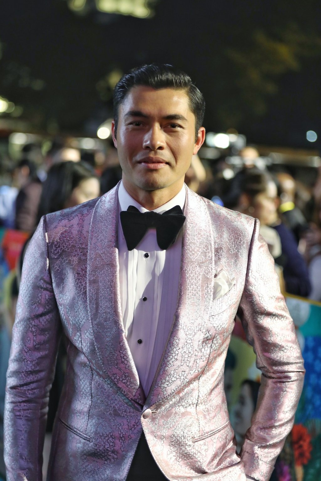 Henry Golding, looking dapper in his suit and bow tie, plays Nick in ‘Crazy Rich Asians’.