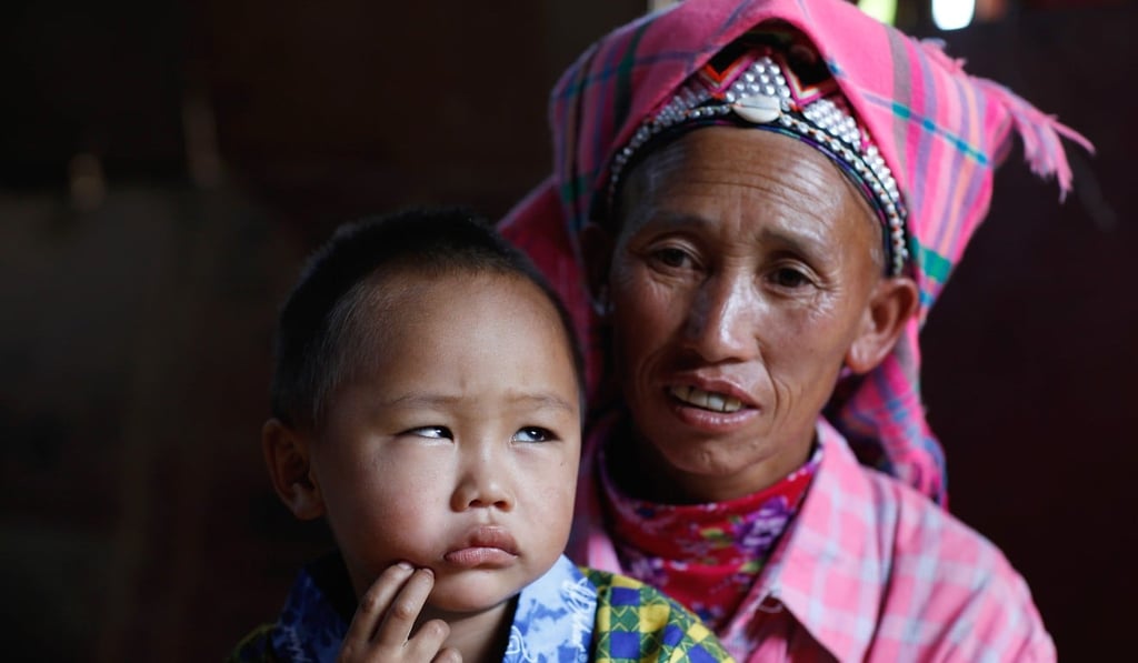 Xiaolong and his grandmother. The family is from the poor ethnic Yi minority community in the mountainous Guangnan county. Photo: Handout Xiaolong and his grandmother. The family is from the poor ethnic Yi minority community in the mountainous Guangnan county. Photo: Handout