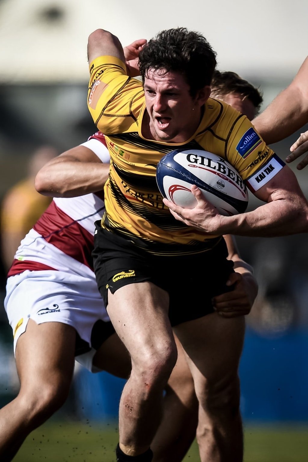 Tigers scrumhalf Josh Walden looks to attack the Kowloon defence. Tigers scrumhalf Josh Walden looks to attack the Kowloon defence.