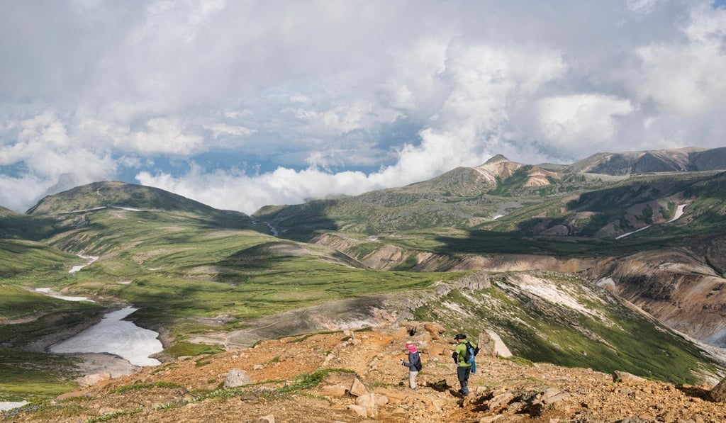 Trekkers in Daisetsuzan National Park, Hokkaido. Photo: Alamy