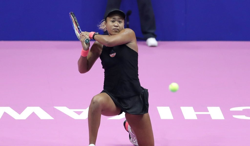 Naomi Osaka in action against Karolina Pliskova during the final of the Pan Pacific Open. Photo: EPA Naomi Osaka in action against Karolina Pliskova during the final of the Pan Pacific Open. Photo: EPA