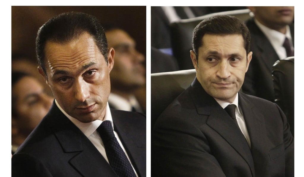 Gamal Mubarak, left, and Alaa Mubarak, right, pictured here in 2011 are on trial on insider trading charges but free on bail. Photo: AP