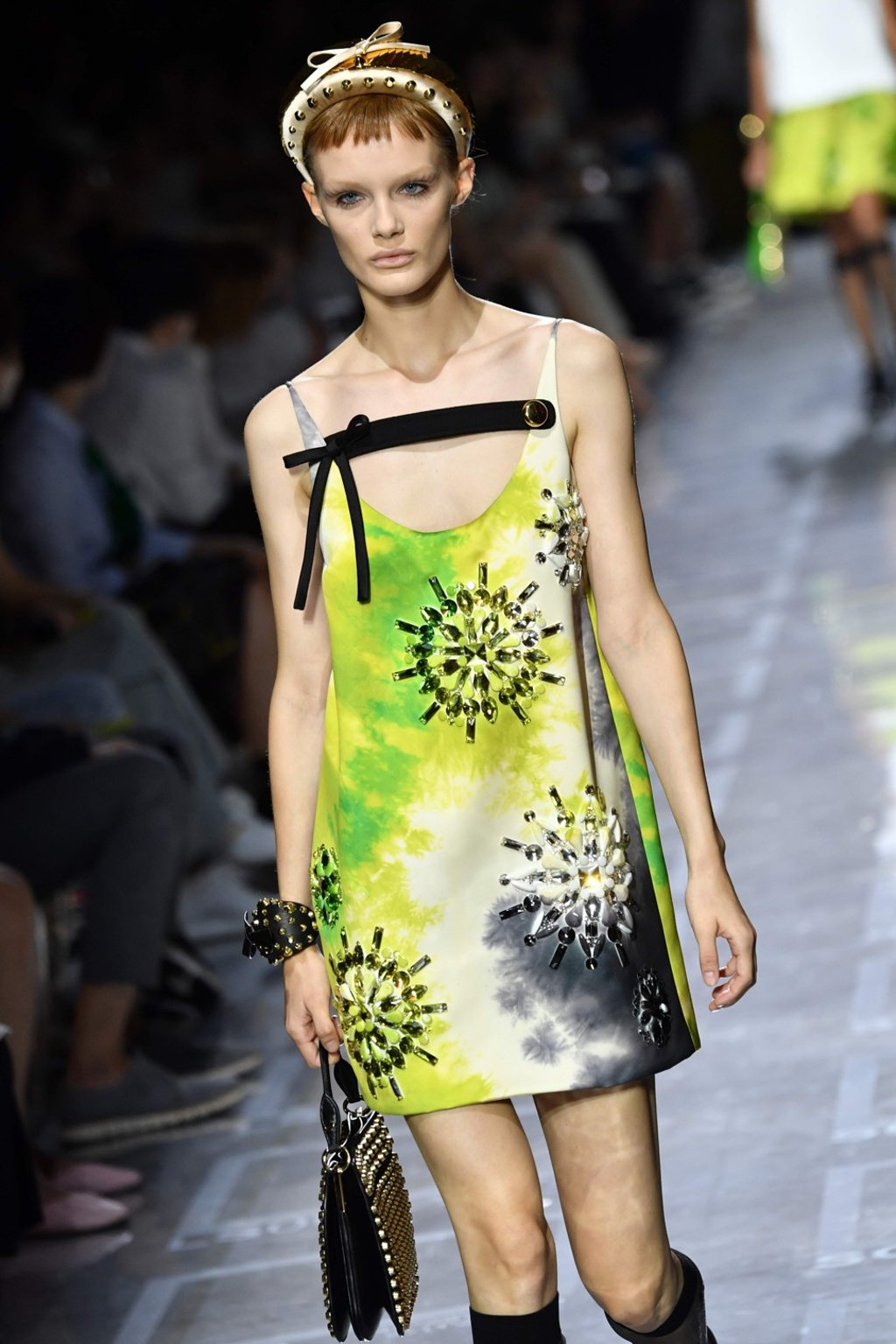 Prada said her favourite look of the evening was a white and lime green oversize shirt dress embellished with big plastic sequins. Photo: AFP