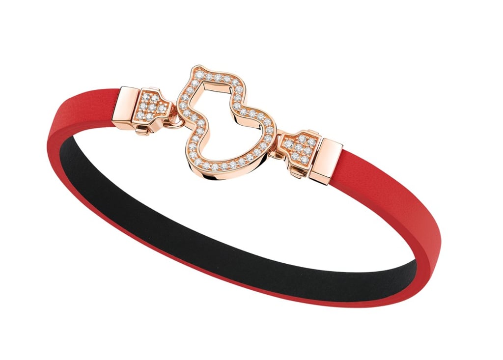 Qeelin’s new Wulu bracelet with a red strap