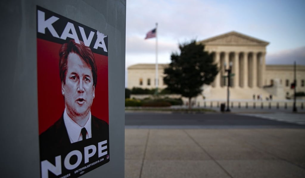 A sticker opposing Kavanaugh’s nomination to the US Supreme Court, which is in the background. Photo: Bloomberg A sticker opposing Kavanaugh’s nomination to the US Supreme Court, which is in the background. Photo: Bloomberg
