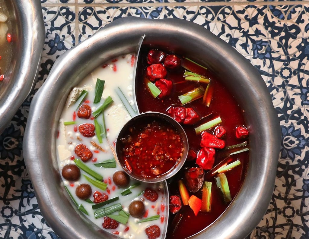 The signature yin yan hotpot has a thick pork bone broth made for the Hong Kong market and Quan Alley’s signature mala (numbing spice).