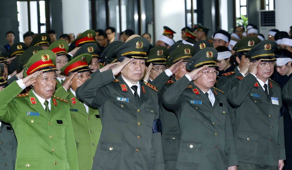 Government officials pay tribute to late President in Tran Dai Quang in Hanoi. Photo: EPA
