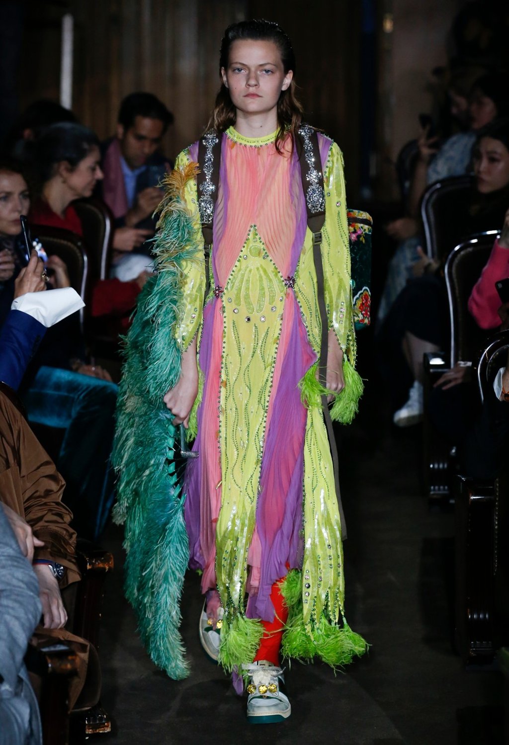 Rose Daniels wears a kaleidoscopic feather gown. Rose Daniels wears a kaleidoscopic feather gown.