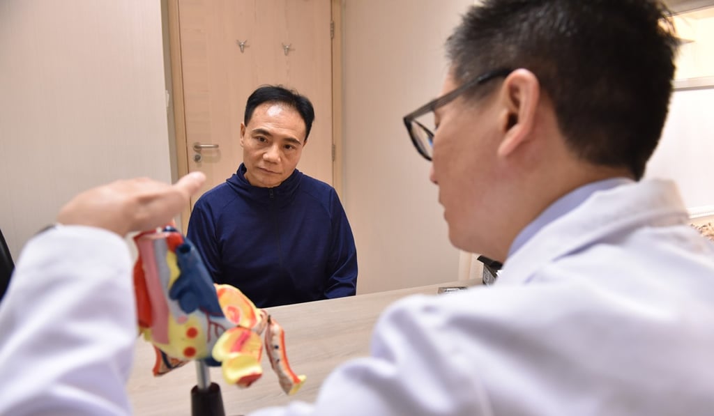 Dr Jeffrey Fung at Hong Kong Adventist Hospital – Stubbs Road explains to atrial fibrillation patient Yeung Yuk-kong his condition and treatment options. Photo: Ali Ghorbani Dr Jeffrey Fung at Hong Kong Adventist Hospital – Stubbs Road explains to atrial fibrillation patient Yeung Yuk-kong his condition and treatment options. Photo: Ali Ghorbani
