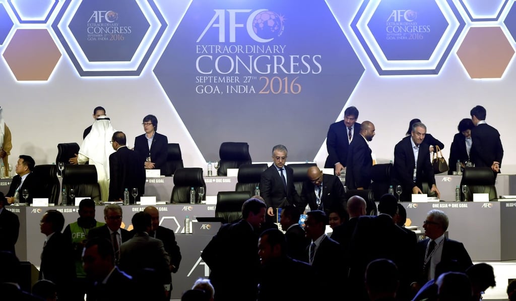 Sheikh Salman bin Ebrahim Al-Khalifa (centre) looks on after a 2016 AFC Extraordinary Congress in Goa. Photo: AFP