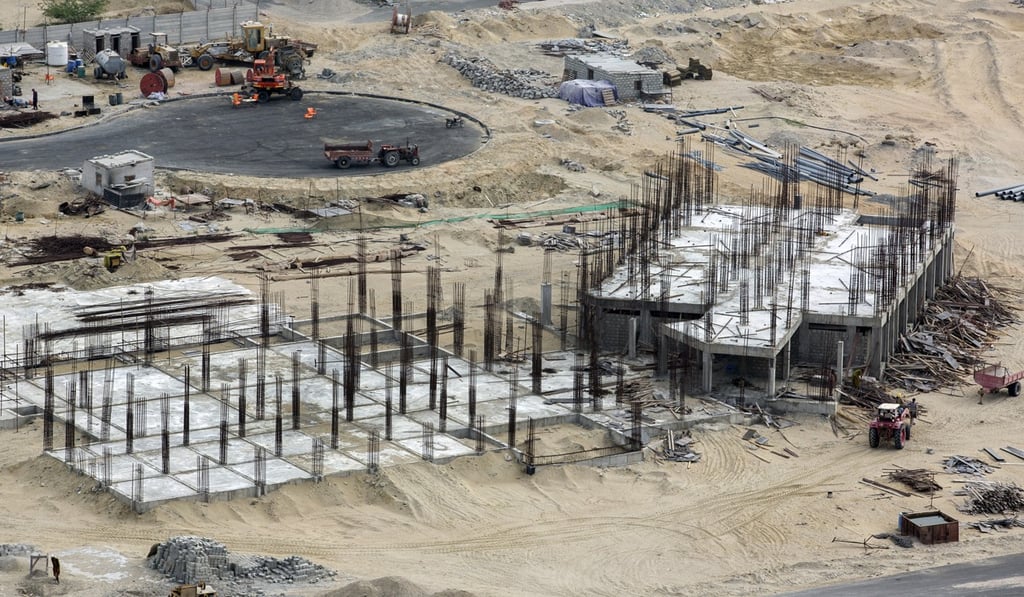 A building stands under construction at a development site, operated by China Overseas Ports Holding Co, near Gwadar Port in Balochistan, Pakistan, on July 4. The former small fishing town on the southwestern corner of Pakistan is making way for the construction of roads and buildings to house banks, and insurance and clearing agents. Photo: Bloomberg