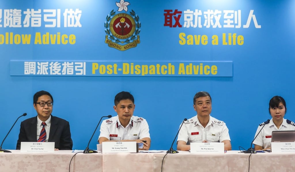 (From left) Choi Yu-fai, Yeung Yan-kin and fire services colleagues explain the new system. Photo: Xiaomei Chen