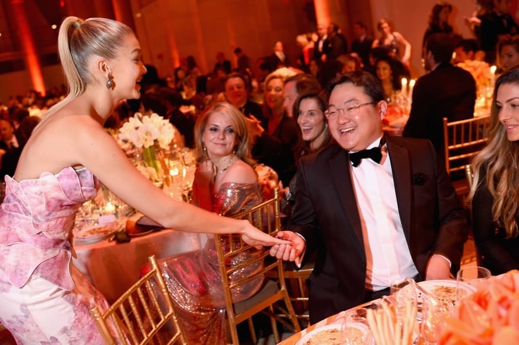 Malaysian fugitive businessman Jho Low, seen with Gigi Hadid (left) at the Angel Ball in New York in 2014, is also known as the ‘Asian Gatsby’ due to his lavish spending and social awkwardness. Photo: AFP