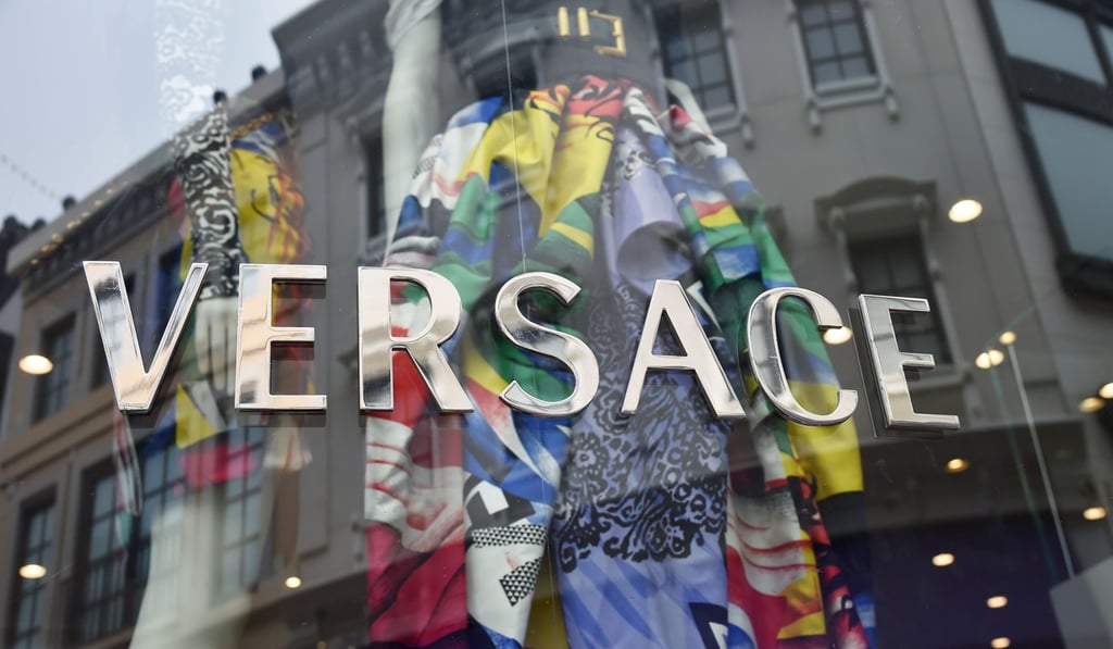 The acquisition of Versace by Michael Kors is not the only fashion industry development setting tongues wagging in Paris this week. Photo: AFP The acquisition of Versace by Michael Kors is not the only fashion industry development setting tongues wagging in Paris this week. Photo: AFP