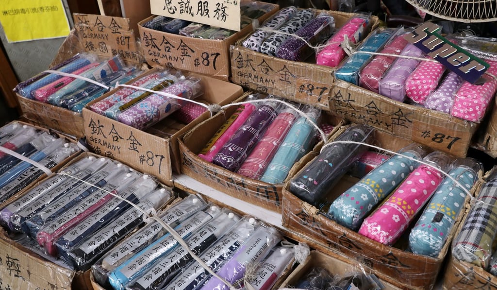 ‘Right now, I’ve got 680 broken umbrellas waiting to be fixed,’ Yau says. Photo: K.Y. Cheng