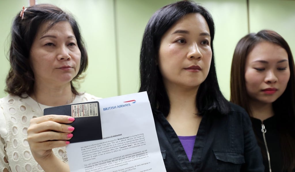 Carol Ng (centre) with a letter issued by BA. Photo: Edward Wong