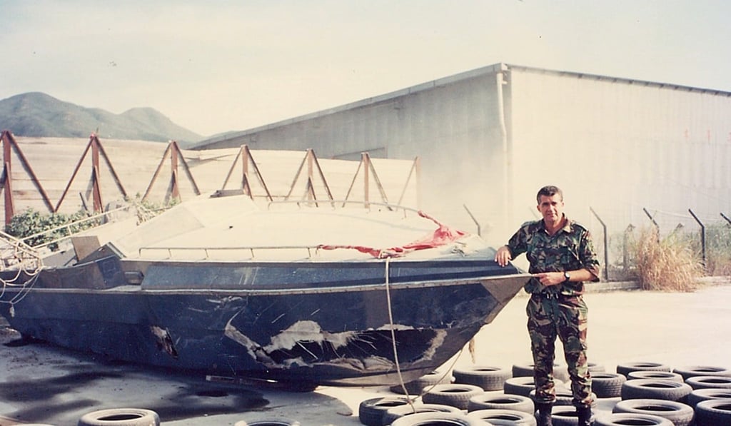 Leslie Bird with a captured “daai fei” speedboat in 1980.