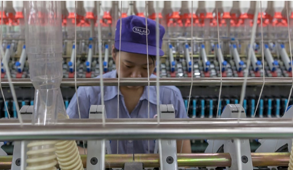 A textile factory in Wuxi, Jiangsu province. Photo: EPA-EFE A textile factory in Wuxi, Jiangsu province. Photo: EPA-EFE