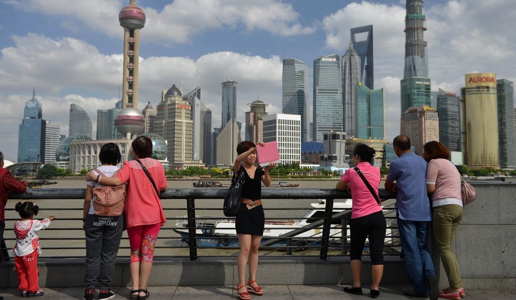 Outlays by domestic Chinese investors on whole-building acquisitions fell by 18 per cent in the first half from a year earlier. Photo: AFP