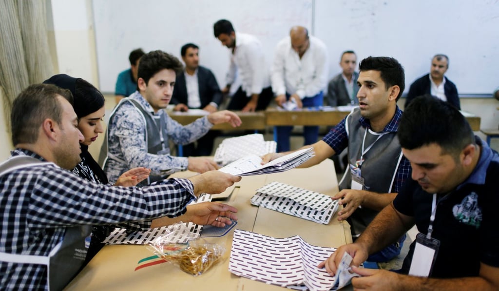 Kurdish employees take part in vote counting, during parliamentary elections in the semi-autonomous region in Arbil, Iraq. Photo: Reuters