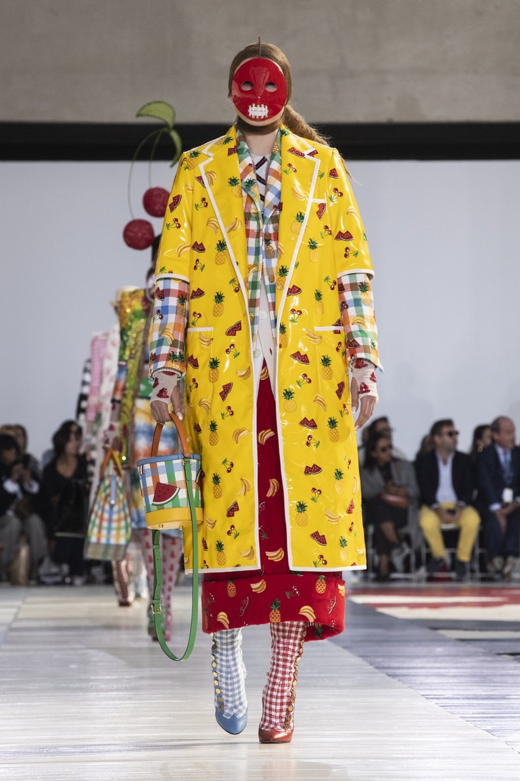 A red-masked model presents creations from the Thom Browne’s spring/summer 2019 collection show at Paris Fashion Week. Photo: EPA-EFE