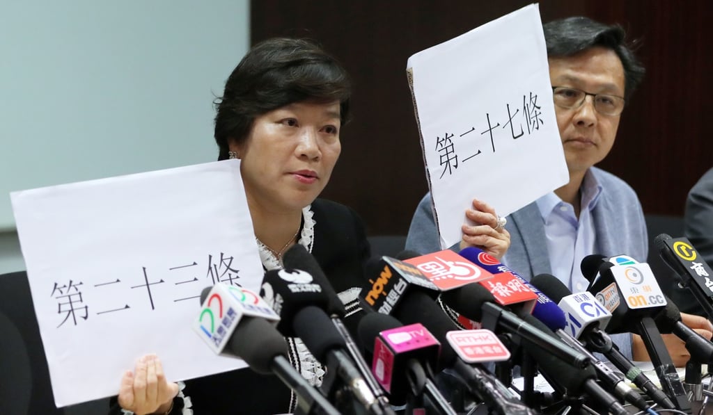Lawmakers Priscilla Leung Mei-fun and Junius Ho Kwan-yiu denounce Hong Kong’s Foreign Correspondents’ Club after it proceeded with a talk by Andy Chan Ho-tin of the Hong Kong National Party. Leung has, since the ban on Chan’s party, called for Demosisto to go as well. Photo: Edward Wong