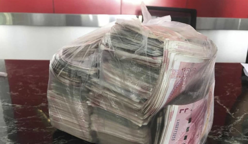 The cash had been mistaken for rubbish by a cleaner at the company.Photo: China News