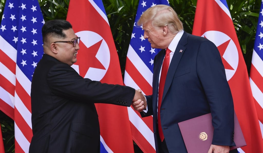 North Korean leader Kim Jong-un and US President Donald Trump shake hands at the conclusion of their meetings in Singapore on June 12. The Trump administration has been criticised for not pinning Kim down on denuclearisation. Photo: AP