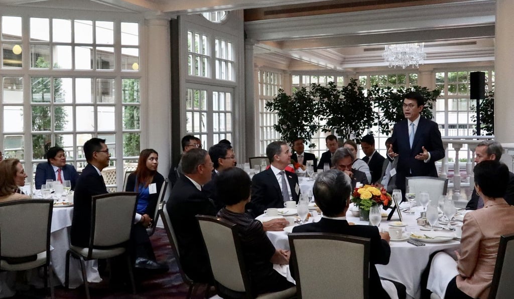 Edward Yau, standing, recently led a delegation to Washington to lobby officials and brief them on the impact the trade war was having on Hong Kong. Photo: Handout Edward Yau, standing, recently led a delegation to Washington to lobby officials and brief them on the impact the trade war was having on Hong Kong. Photo: Handout