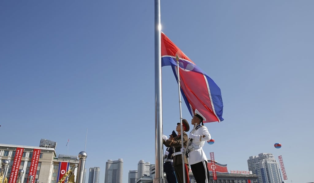 Soldiers raise the North Korea national flag before a parade for the 70th anniversary of North Korea's founding day in the capital Pyongyang. Photo: AP
