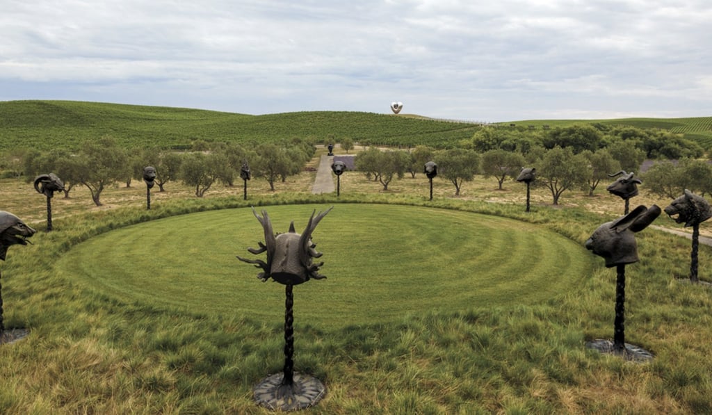 Circle of Animals/Zodiac Heads (2011) by Ai Weiwei with Love Me (2016) by Richard Hudson. Photo: Donum Estate