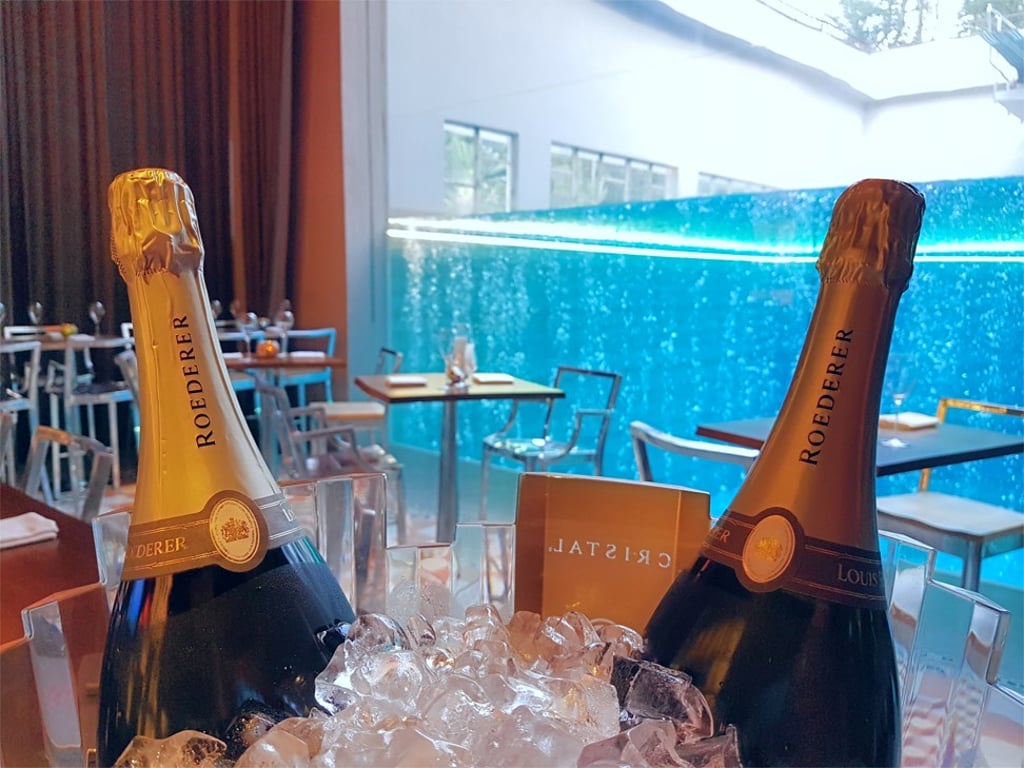 Oysters and Roederer Champagne are served at Fish Pool, an effervescent bar at the city’s latest exclusive haunt, The NCO Club at JW Marriott Singapore.