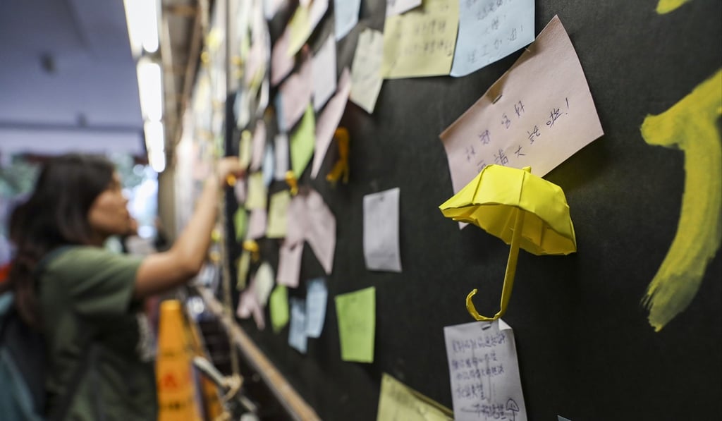 Separatist talk has spread to universities in Hong Kong. In September, the Hong Kong Polytechnic University asked a student union to remove independence banners from a democracy wall. Photo: Winson Wong
