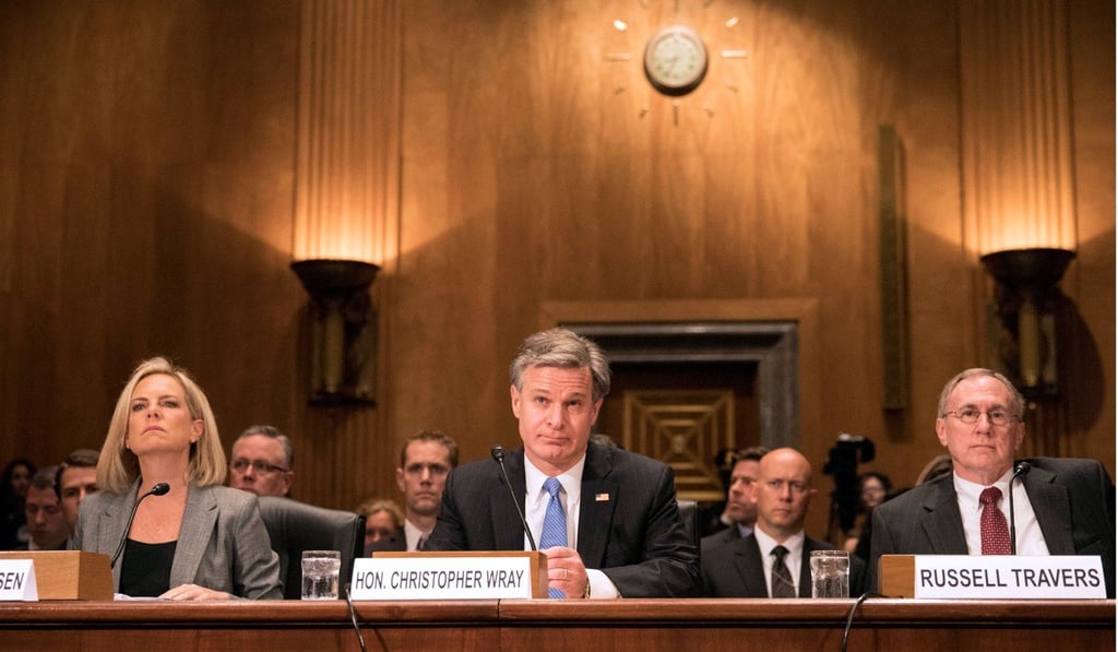 Homeland Security Secretary Kirstjen Nielsen, FBI Director Christopher Wray and Russell Travers, acting director of the National Counterterrorism Centre, testify before a Senate Homeland Security and Government Affairs Committee hearing on Wednesday. Photo: Reuters