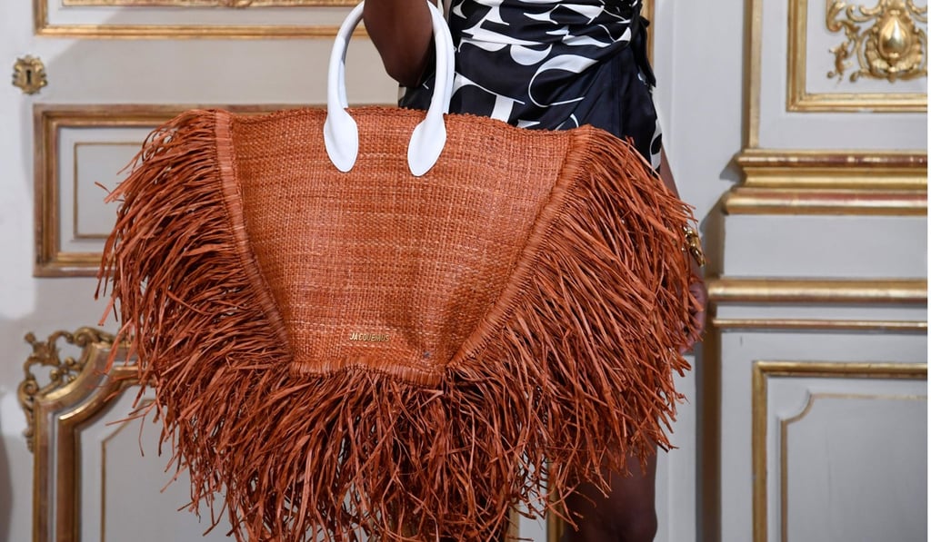 Jacquemus’ oversized straw bag is certain to be the accessory of next year. Picture: AFP