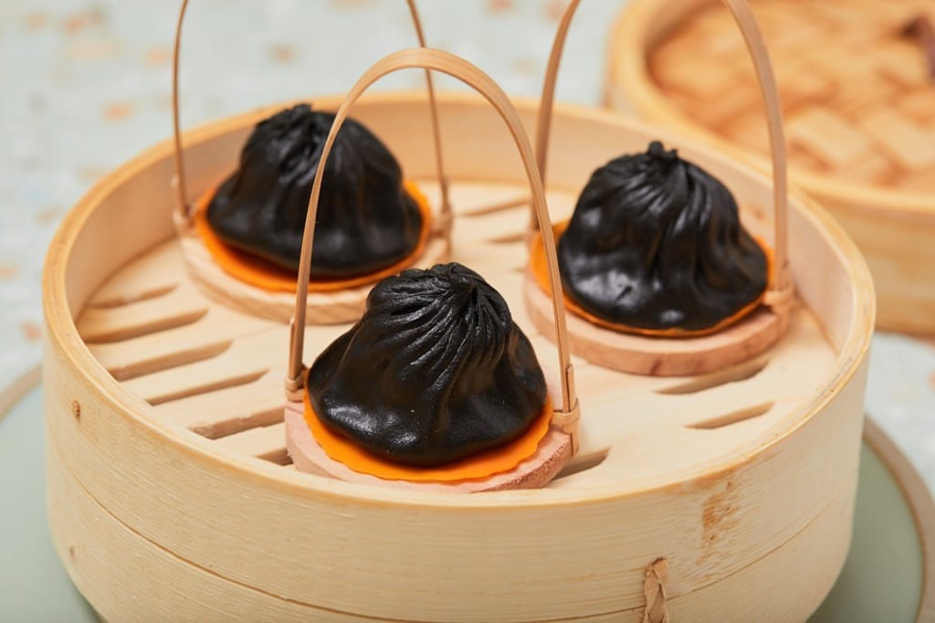 Black squid ink seafood soup dumpling, which is one of the dishes served at John Anthony, the dim sum and Chinese restaurant, in Causeway Bay. Black squid ink seafood soup dumpling, which is one of the dishes served at John Anthony, the dim sum and Chinese restaurant, in Causeway Bay.
