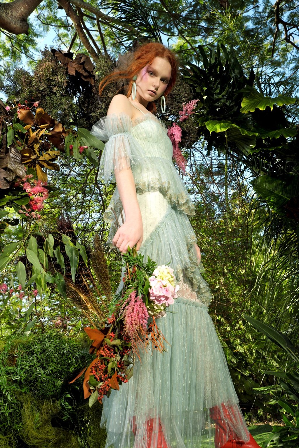Gucci, tights, price on request; Alice McCall, dress, AUD890; Dinosaur Designs, celadon earrings, price on request; Bottega Veneta, boots, HK$9,500