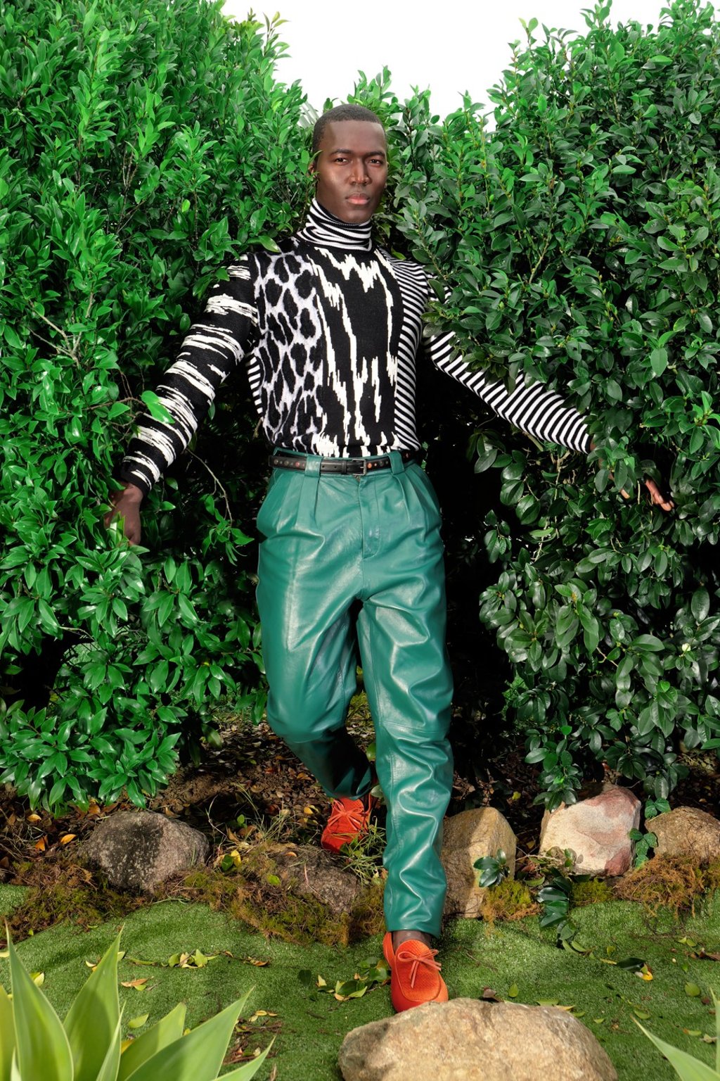 ON BOBBY: Givenchy, sweater, HK$24,500, leather trousers, HK$12,200; Bottega Veneta, loafers, HK$6,100, belt, HK$5,000; ON GRACE: Saint Laurent by Anthony Vaccarello, trench coat, HK$48,000, bootcut denims, HK$4,990, belt, HK$2,900; Gucci, silk carre, HK$4150, necklace with aged palladium finish, HK$21,000; Alice McCall, t-shirt, AUD290; Dinosaur Designs, choker, USD850; Bottega Veneta, boots, HK$9,500