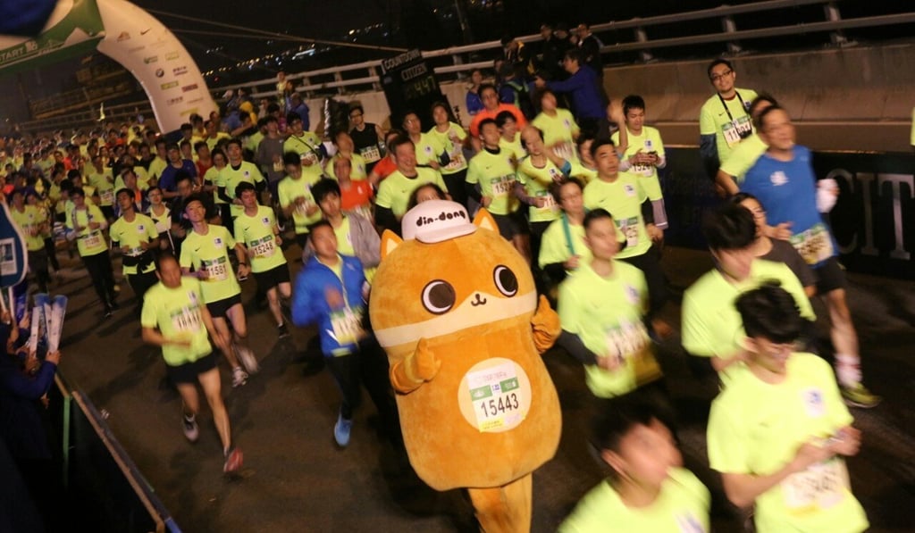 Hongkongers are getting sportier, as evidenced by the growing participation in the annual Standard Chartered Hong Kong Marathon. Photo: SCMP / Felix Wong