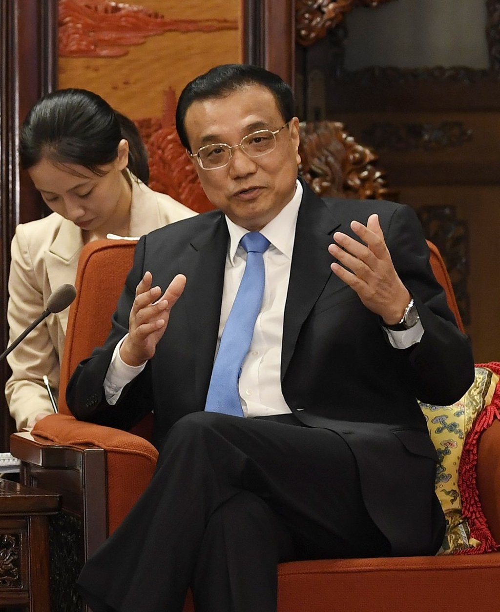 Chinese Premier Li Keqiang (pictured on Wednesday) has said he hopes pharmaceutical companies could sell drugs at lower prices. Photo: EPA-EFE