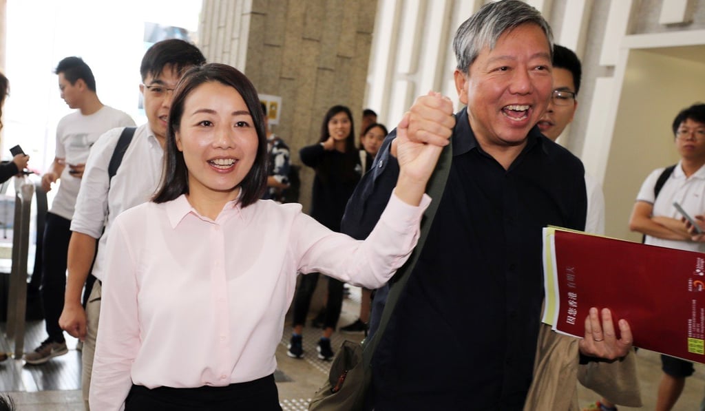 Lee Cheuk-yan (right) had signed up for the poll to act as a ‘plan B’ in case Lau (left) was disqualified. Photo: Edward Wong/SCMP